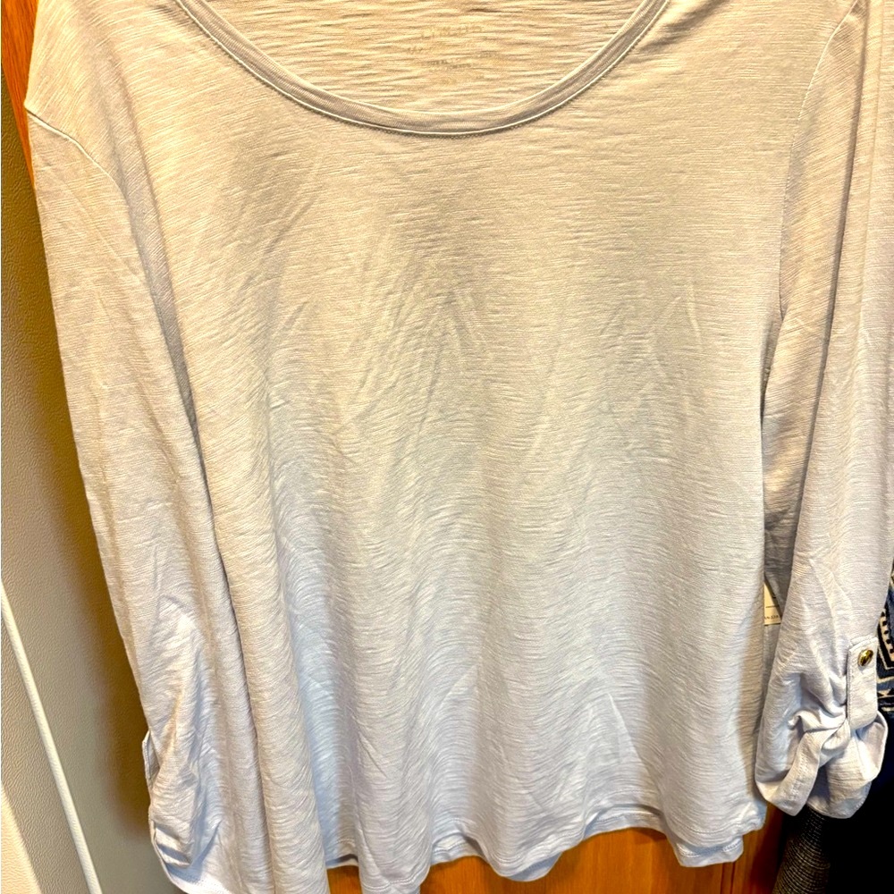 Chicos Women's Light blue top. Size 3=XL
60% cotton 40% modal
Ptp=23” length=26”